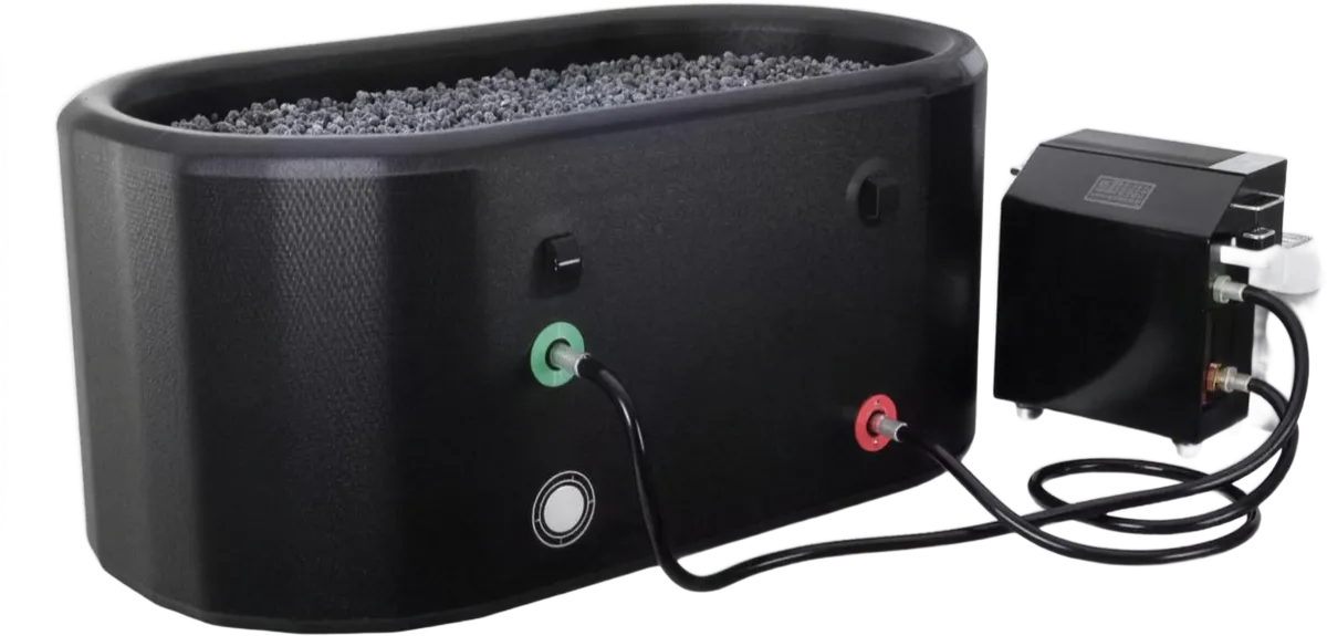 Portable black ice bath filled with ice, with its chiller unit and hoses