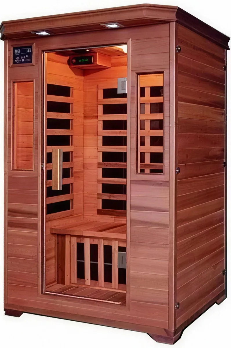 Two-seat infrared sauna in red cedar with a glass door and control panel